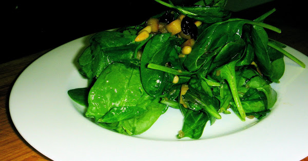 In this warm spinach salad, spinach is prepared in the classic Roman style with raisins, pine nuts and sautéed apples, but the recipe could be adjusted in any number of ways. For a nice winter side dish turn your favorite spinach salad into a warm wilted salad employing this method. It's delicious. // alexandracooks.com In this warm spinach salad, spinach is prepared in the classic Roman style with raisins, pine nuts and sautéed apples, but the recipe could be adjusted in any number of ways. For a nice winter side dish turn your favorite spinach salad into a warm wilted salad employing this method. It's delicious. // alexandracooks.com