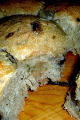 Sometimes nothing satisfies like warm bread and butter. These rosemary-olive pull-apart dinner rolls release steam as they are separated and are delicious when served immediately with softened butter. // alexandracooks.com