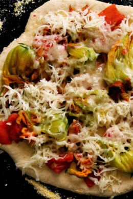 Ever since I learned how to stuff squash blossoms, batter them and fry them, I've looked forward to the summer growing season, which would bring these delicate flowers to market. Seeing squash blossoms was always a treat. // alexandracooks.com