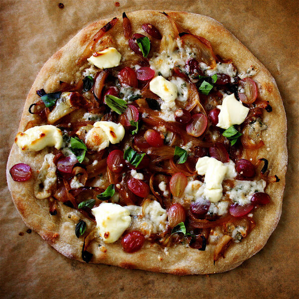 Really, for me, the idea of a perfect dinner is this: several thin-crust pizzas (each topped differently), a salad (a homemade Caesar salad sounds nice at the moment) and a glass of wine. Cooking these pizzas in a wood-burning oven is the only way this recipe could be improved. Desperately want to make one of these adobe ovens I saw being built at San Francisco's Slow Food Nation. // alexandracooks.com