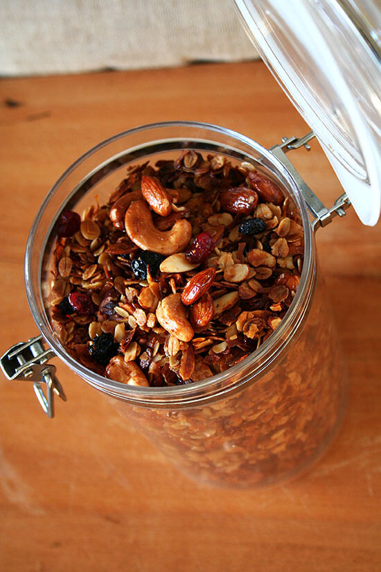 This homemade granola is delectable. The base recipe has been adapted from the Barefoot Contessa and the candied nut recipe comes from one of the Moosewood cookbooks. With the addition of dried cranberries and blueberries, this granola makes the best breakfast/snack/lunch/dinner ever. Seriously. // alexandracooks.com