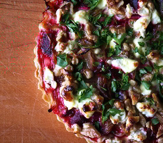 This goat cheese walnut tart is really fun. And different. And delicious. I can't promise a quick-and-easy dinner with this recipe — beets must be roasted; a tart shell must be baked — but with a little planning, assembly of this tart is quite simple. And it is so worth the effort. // alexandracooks.com This goat cheese walnut tart is really fun. And different. And delicious. I can't promise a quick-and-easy dinner with this recipe — beets must be roasted; a tart shell must be baked — but with a little planning, assembly of this tart is quite simple. And it is so worth the effort. // alexandracooks.com