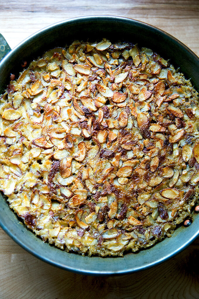 A bowl of freshly baked steel cut oatmeal with almonds. 