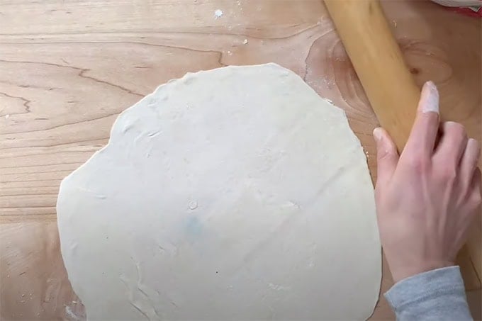 Rolled out tortilla dough.