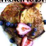 A plate of just-baked overnight French toast topped with berries.