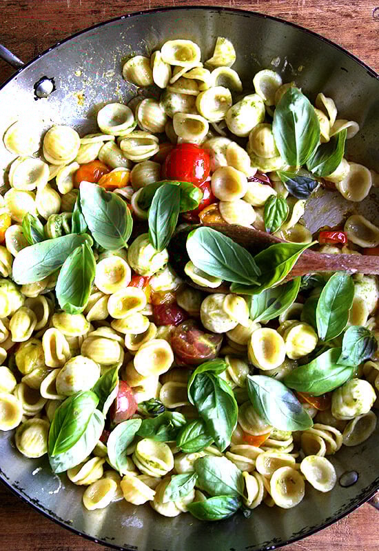This summer pasta dish simple to prepare: Sauté cherry tomatoes with orecchiette, ciliegene mozzarella and basil pesto. Add some fresh basil just before plating along with some shavings of Parmigiano Reggiano and fresh cracked pepper. Yum yum yum. // alexandracooks.com This summer pasta dish simple to prepare: Sauté cherry tomatoes with orecchiette, ciliegene mozzarella and basil pesto. Add some fresh basil just before plating along with some shavings of Parmigiano Reggiano and fresh cracked pepper. Yum yum yum. // alexandracooks.com
