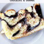 A plate of A board with orange-chocolate babka.