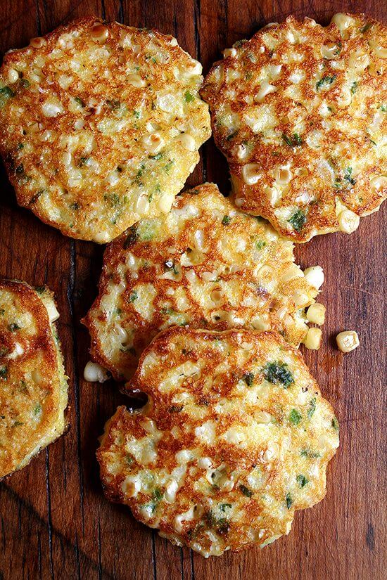 These crispy corn fritters are simply irresistible. I served them aside broiled fish but I love the idea of making them the star of the meal, serving them with a simple salad tossed in a citrus vinaigrette. // alexandracooks.com These crispy corn fritters are simply irresistible. I served them aside broiled fish but I love the idea of making them the star of the meal, serving them with a simple salad tossed in a citrus vinaigrette. // alexandracooks.com