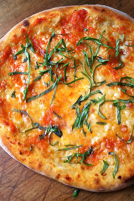 With the help of Marcella Hazan's homemade tomato sauce, classic pizza margherita can be achieved at home with delectable results. And thanks to the Barefoot Contessa, making homemade ricotta is easy and delicious. // alexandracooks.com With the help of Marcella Hazan's homemade tomato sauce, classic pizza margherita can be achieved at home with delectable results. And thanks to the Barefoot Contessa, making homemade ricotta is easy and delicious. // alexandracooks.com