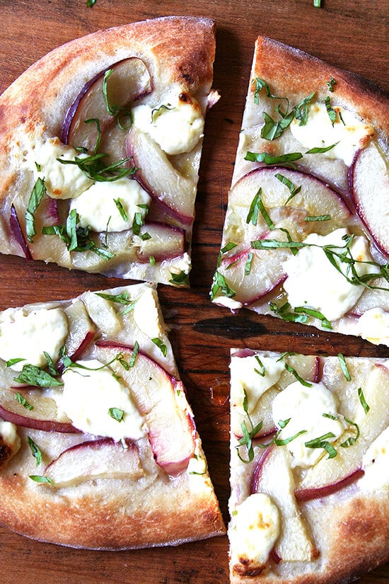 With the help of Marcella Hazan's homemade tomato sauce, classic pizza margherita can be achieved at home with delectable results. And thanks to the Barefoot Contessa, making homemade ricotta is easy and delicious. // alexandracooks.com With the help of Marcella Hazan's homemade tomato sauce, classic pizza margherita can be achieved at home with delectable results. And thanks to the Barefoot Contessa, making homemade ricotta is easy and delicious. // alexandracooks.com