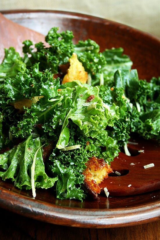 The dressing in this kale caesar salad, made without mayonnaise or cheese, is lemony and light and is a wonderful complement to kale, an unsuspecting substitute in a classic dish. // alexandracooks.com The dressing in this kale caesar salad, made without mayonnaise or cheese, is lemony and light and is a wonderful complement to kale, an unsuspecting substitute in a classic dish. // alexandracooks.com