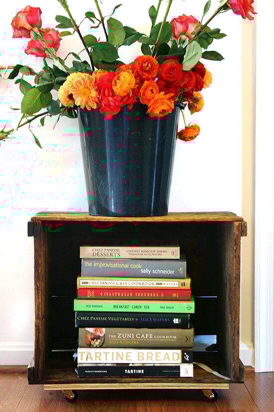 Looking for a purpose for old farm crates collecting dust in your basement? Try this farm crate bookshelf tutorial. It's not rocket science, will free up space in your home, and looks amazing! // alexandracooks.com Looking for a purpose for old farm crates collecting dust in your basement? Try this farm crate bookshelf tutorial. It's not rocket science, will free up space in your home, and looks amazing! // alexandracooks.com