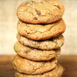 The very best molasses crinkles stacked on a table.