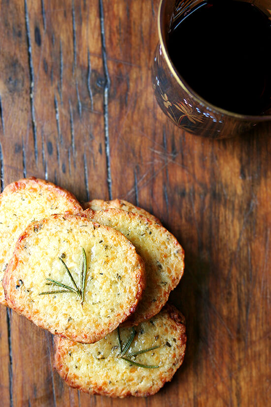 These salty parmesan rosemary crackers beg to be washed down with a heartwarming libation, one made with red wine and port, a little something called glogg. Glogg is potent stuff — bone-warming, rosy-cheek inducing, party-starting stuff. It's a beautiful thing. Happy New Year everyone! // alexandracooks.com These salty parmesan rosemary crackers beg to be washed down with a heartwarming libation, one made with red wine and port, a little something called glogg. Glogg is potent stuff — bone-warming, rosy-cheek inducing, party-starting stuff. It's a beautiful thing. Happy New Year everyone! // alexandracooks.com