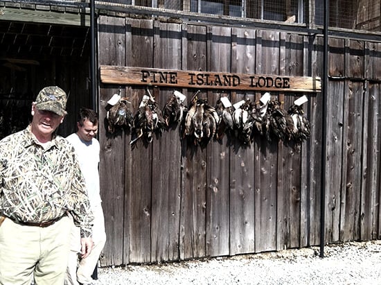 Pine Island Lodge A wall of Pine Island Lodge with killed wild ducks hanging from hooks.