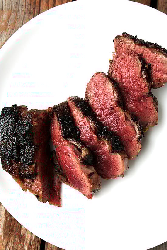 This Sally Schneider recipe for seared duck breasts with port wine reduction is a good one to have in your repertoire — it's simple yet it's bistro quality. This is a perfect dish for a date night at home. // alexandracooks.com A plate with seared wild duck breasts.