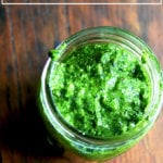 A jar of homemade pesto sauce.