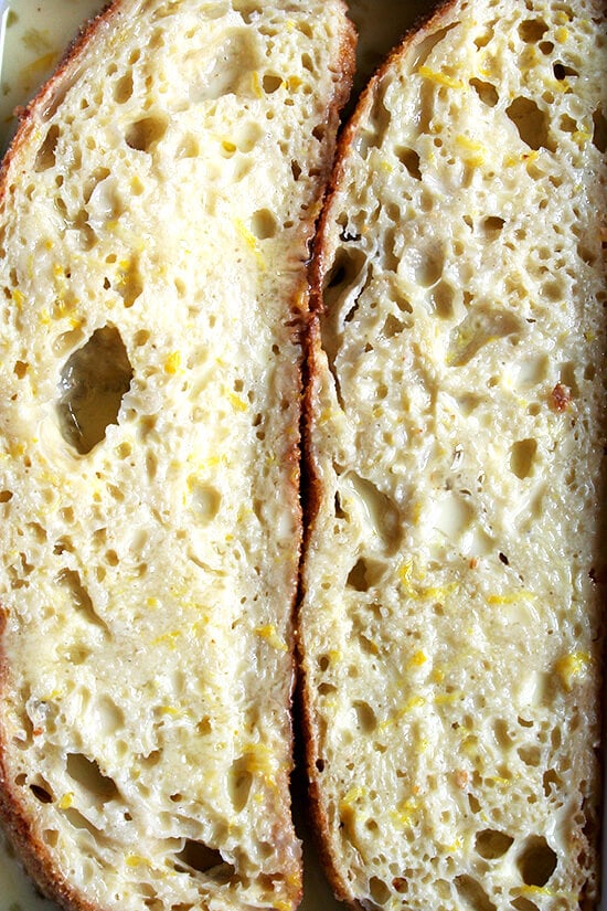 bread soaking with milk, eggs, sugar and lemon zest bread soaking with milk, eggs, sugar and lemon zest