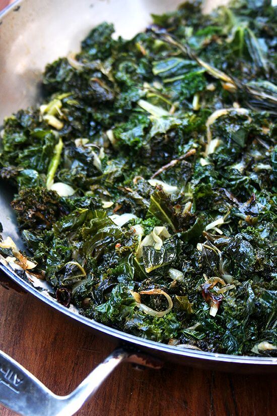 It's dishes such as this that make me understand (almost) how people can be vegetarian. In In this slow-cooked kale, kale is blanched first, roughly chopped and then sautéed over low heat for thirty minutes in olive oil with onions, garlic, rosemary and chile de árbol. It's almost black and slightly crispy when finished. It is sweet and addictive. // alexandracooks.com It's dishes such as this that make me understand (almost) how people can be vegetarian. In In this slow-cooked kale, kale is blanched first, roughly chopped and then sautéed over low heat for thirty minutes in olive oil with onions, garlic, rosemary and chile de árbol. It's almost black and slightly crispy when finished. It is sweet and addictive. // alexandracooks.com