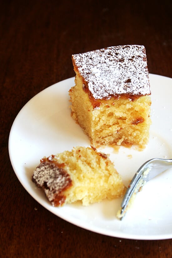 A slice of almond torte on a plate.
