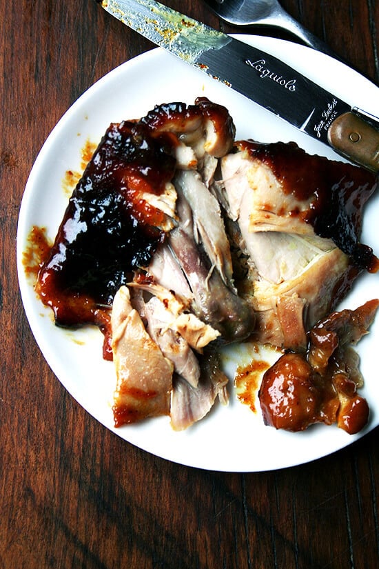 These honey-baked chicken legs are all about the sauce, a mixture of honey and mustard, curry powder and mango chutney, which thickens and concentrates during the hour or so spent in the oven. It's the kind of thing that is nearly impossible not to pick up off the plate with your hands, gnaw at the bone, lick your fingers when you're finished. // alexandracooks.com These honey-baked chicken legs are all about the sauce, a mixture of honey and mustard, curry powder and mango chutney, which thickens and concentrates during the hour or so spent in the oven. It's the kind of thing that is nearly impossible not to pick up off the plate with your hands, gnaw at the bone, lick your fingers when you're finished. // alexandracooks.com