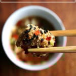 A bite of sesame-crusted tofu with nuoc cham.