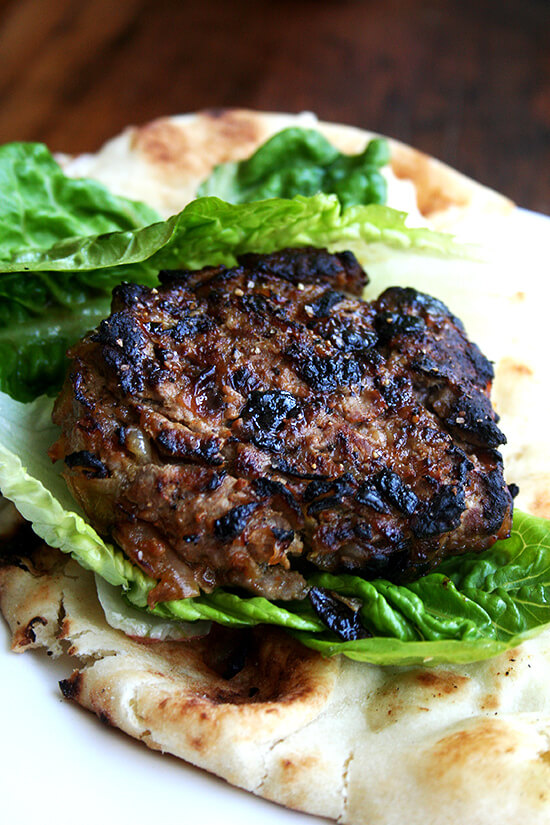 Seasoned with curry powder and cumin as well as caramelized onions and a dollop of chutney mustard, these lamb burgers might just be what you need to re-awaken those palates in this uninspiring in-between-seasons period. Serving the burgers in half pieces of warm naan with some crisp lettuce makes for a nice change from the standard burger bun. Cheese doesn't seem to fit here, but something cool and tangy like Greek yogurt is a must. // alexandracooks.com Seasoned with curry powder and cumin as well as caramelized onions and a dollop of chutney mustard, these lamb burgers might just be what you need to re-awaken those palates in this uninspiring in-between-seasons period. Serving the burgers in half pieces of warm naan with some crisp lettuce makes for a nice change from the standard burger bun. Cheese doesn't seem to fit here, but something cool and tangy like Greek yogurt is a must. // alexandracooks.com