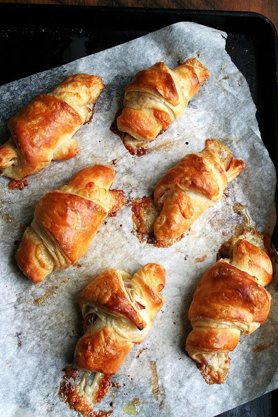 Freshly baked ham and cheese croissants.