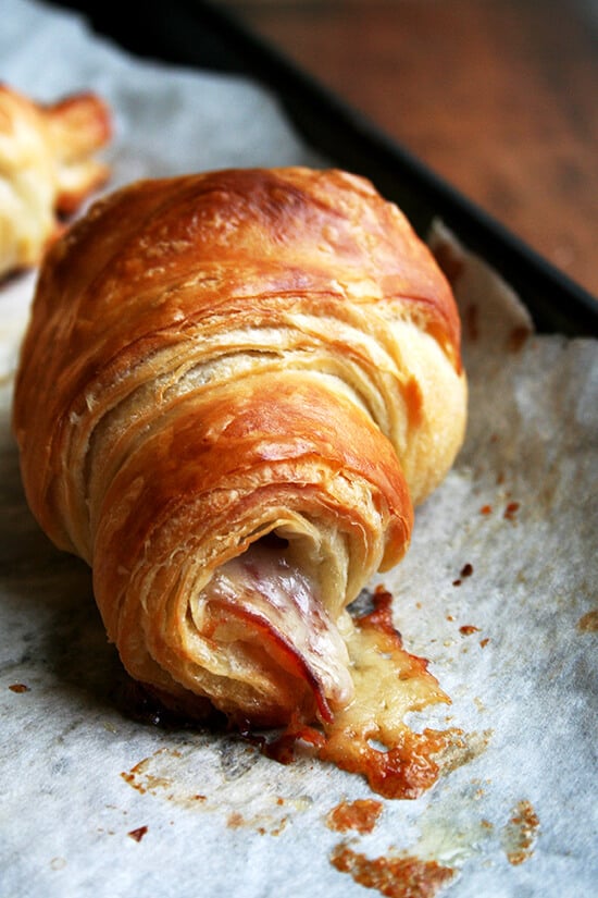 A baked ham and cheese croissant. 
