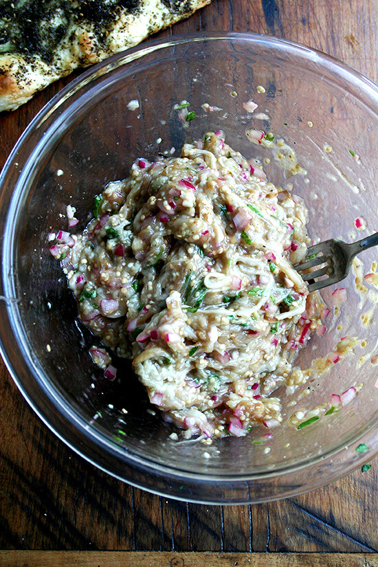 Charred eggplant produces a creaminess without the help of oil, and the charring moreover imparts such a nice smokiness to the eggplant's flesh. Some sort of flatbread or grilled bread is a must with each of these preparations, and if you happen to have some za'atar in your pantry, the aromatic spice mixture complements the eggplant so nicely. // alexandracooks.com Charred eggplant produces a creaminess without the help of oil, and the charring moreover imparts such a nice smokiness to the eggplant's flesh. Some sort of flatbread or grilled bread is a must with each of these preparations, and if you happen to have some za'atar in your pantry, the aromatic spice mixture complements the eggplant so nicely. // alexandracooks.com