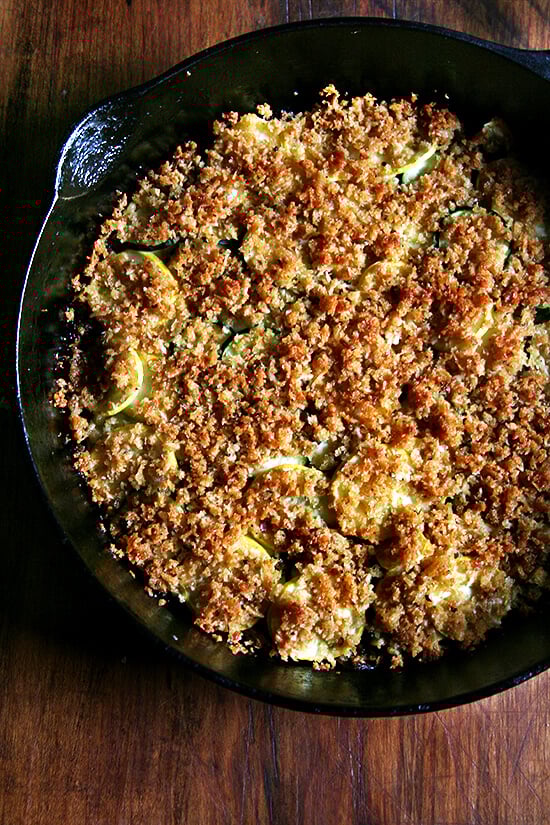 This summer squash gratin couldn't be simpler to throw together, and unlike so many gratins, this one is not laden with cream and cheese. You also can't mess it up. The layer of vegetables can be thin or thick. There's no perfect ratio of squash to topping. This dish is rustic. It's fast. It's easy. Go wild. // alexandracooks.com This summer squash gratin couldn't be simpler to throw together, and unlike so many gratins, this one is not laden with cream and cheese. You also can't mess it up. The layer of vegetables can be thin or thick. There's no perfect ratio of squash to topping. This dish is rustic. It's fast. It's easy. Go wild. // alexandracooks.com