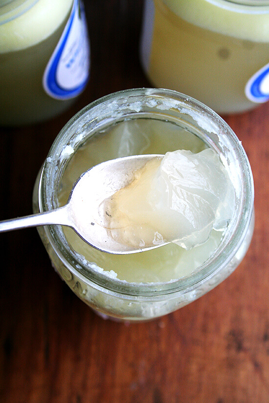 An overhead shot of a very gelatinous chicken stock.