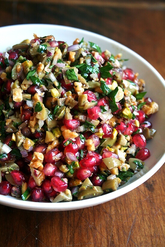 This pomegranate salad recipe comes from the book Turquoise by Greg and Lucy Malouf, which my aunt introduced to the family last winter when she served this stunning salad at a dinner party. The myriad textures and sweet-salty-hot dressing make this salad irresistible. // alexandracooks.com This pomegranate salad recipe comes from the book Turquoise by Greg and Lucy Malouf, which my aunt introduced to the family last winter when she served this stunning salad at a dinner party. The myriad textures and sweet-salty-hot dressing make this salad irresistible. // alexandracooks.com