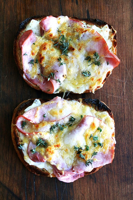 Croque monsieur: Two slices of toast topped with béchamel, ham, and cheese, just broiled.