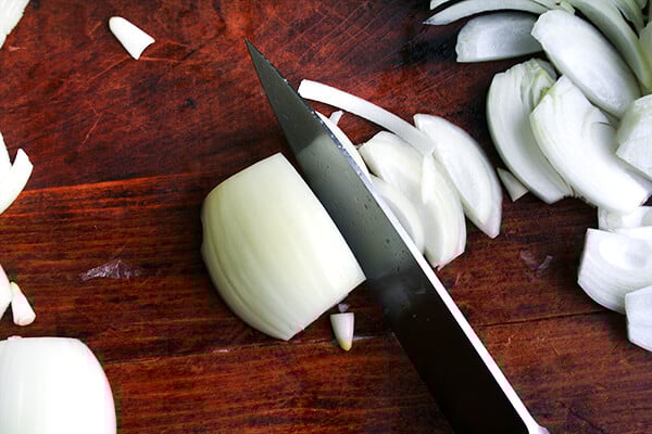 A sliced onion on a board. 