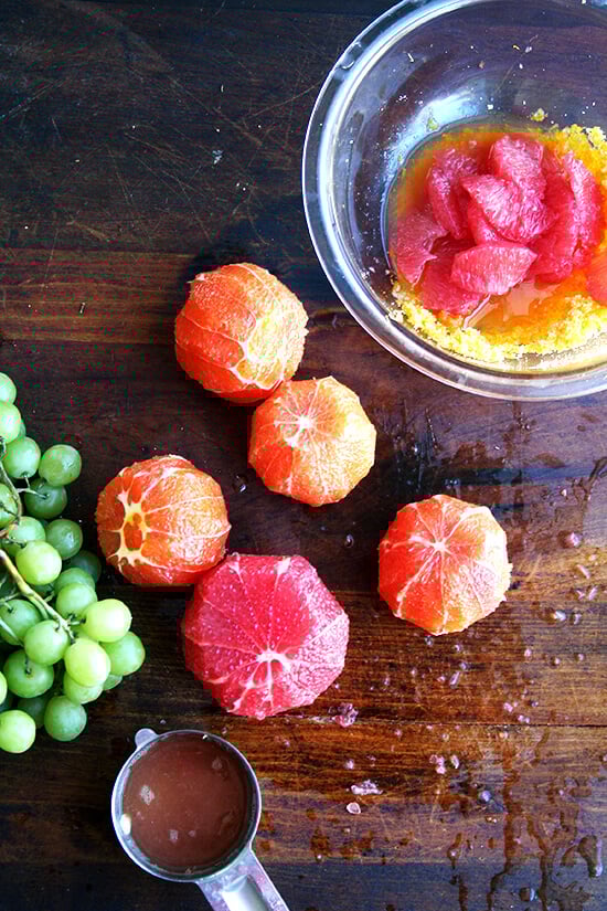 This grape compote mixture of orange, grapefruit and slivered grapes tossed together with citrus sugar and juice is fresh and light and makes an elegant dessert or a nice addition to any breakfast or brunch. And while it's simple in theory to throw together — fruit and sugar are tossed with fresh juice — somehow it takes more time to assemble than you might anticipate. But don't let that deter you. All of the zesting and supreming and slivering are worth every effort. // alexandracooks.com This grape compote mixture of orange, grapefruit and slivered grapes tossed together with citrus sugar and juice is fresh and light and makes an elegant dessert or a nice addition to any breakfast or brunch. And while it's simple in theory to throw together — fruit and sugar are tossed with fresh juice — somehow it takes more time to assemble than you might anticipate. But don't let that deter you. All of the zesting and supreming and slivering are worth every effort. // alexandracooks.com
