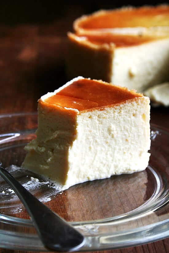 A slice of silky smooth lemon-ricotta cheese cake.