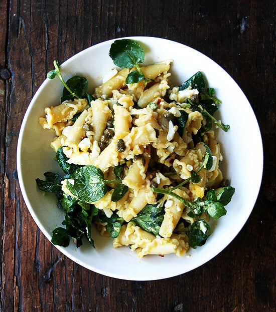 In this campanelle dish, a warm anchovy-caper-olive oil sauce dresses the pasta first; then a splash of lemon juice and reserved cooking liquid thin out the sauce ensuring it coats the pasta nicely; finally chopped hard-boiled eggs and greens complete the dish to make an impromptu, deeply satisfying dinner. // alexandracooks.com In this campanelle dish, a warm anchovy-caper-olive oil sauce dresses the pasta first; then a splash of lemon juice and reserved cooking liquid thin out the sauce ensuring it coats the pasta nicely; finally chopped hard-boiled eggs and greens complete the dish to make an impromptu, deeply satisfying dinner. // alexandracooks.com