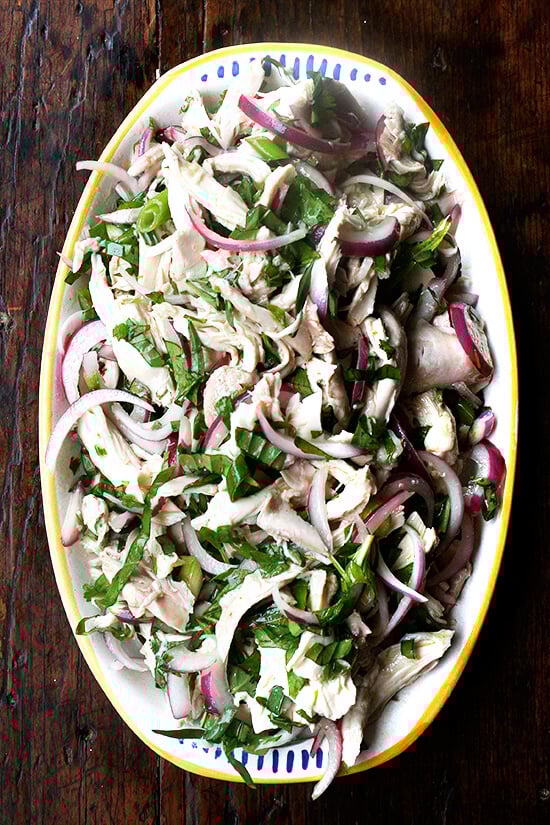 This no-mayo chicken salad is made with a simple dressing of olive oil and vinegar with big, plump pieces of chicken, lots of herbs, and a nice bite in the dressing. It's another nice no-mayo salad to serve at a summer gathering or to bring to a potluck. And there's only one thing to keep in mind while making it: less is not more. Don't be afraid to heap on those herbs. // alexandracooks.com This no-mayo chicken salad is made with a simple dressing of olive oil and vinegar with big, plump pieces of chicken, lots of herbs, and a nice bite in the dressing. It's another nice no-mayo salad to serve at a summer gathering or to bring to a potluck. And there's only one thing to keep in mind while making it: less is not more. Don't be afraid to heap on those herbs. // alexandracooks.com