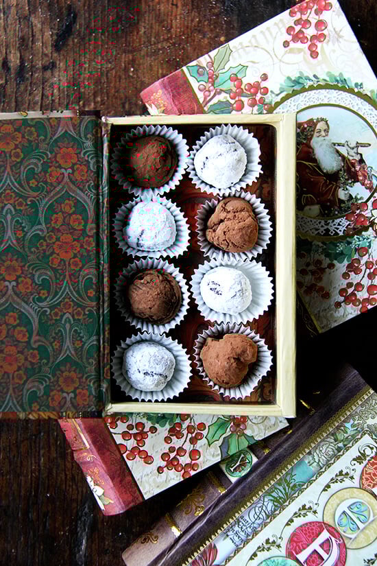 Chocolate truffles make a simple dessert, an elegant homemade gift, a festive treat to break out at impromptu gatherings. One batch, which yields at least 3 dozen, can be made days in advance and stored in the fridge. Easy to make and pretty to boot, what's not to love? // alexandracooks.com A decorative box holding homemade chocolate truffles.