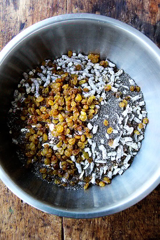 A large bowl with the ingredients to make homemade muesli.