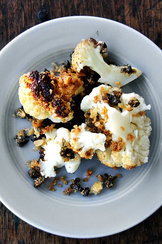 Minimal ingredients, minimal hands on time, this whole-roasted cauliflower with fried capers and brown butter breadcrumbs is a winner. The cauliflower emerges from the oven knife tender but not mushy. Here, the head's edges crisp and caramelize both from the heat of the oven and the oil pooling in the bottom of the pan, and the nutty crumbs and burst capers that nestle in the web of stems and spill all around the serving platter couldn't be more irresistible. // alexandracooks.com Minimal ingredients, minimal hands on time, this whole-roasted cauliflower with fried capers and brown butter breadcrumbs is a winner. The cauliflower emerges from the oven knife tender but not mushy. Here, the head's edges crisp and caramelize both from the heat of the oven and the oil pooling in the bottom of the pan, and the nutty crumbs and burst capers that nestle in the web of stems and spill all around the serving platter couldn't be more irresistible. // alexandracooks.com