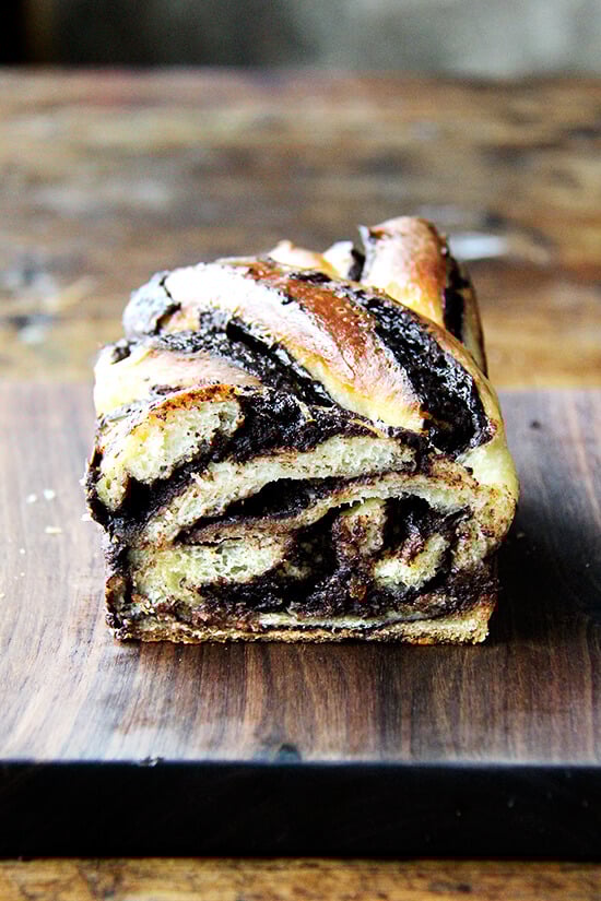 I love this babka hybrid — can't stop eating it! — and as soon as I finish off the remaining loaf on my counter, I am locking up all of my flours and leavening agents and chocolate, and I am putting an end to this baking spree once and for all! // alexandracooks.com Halved loaf of babka.