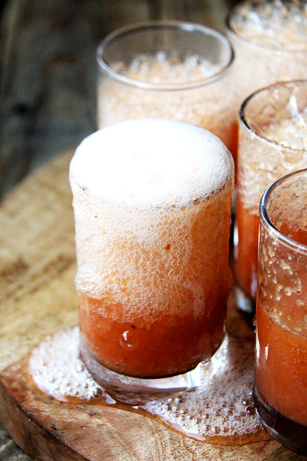 This peach bellini recipe is made by throwing whole peaches, skins and all, into the blender. It is a breeze to throw together and tastes light, summery and refreshing — maybe something festive to consider this weekend? // alexandracooks.com This peach bellini recipe is made by throwing whole peaches, skins and all, into the blender. It is a breeze to throw together and tastes light, summery and refreshing — maybe something festive to consider this weekend? // alexandracooks.com