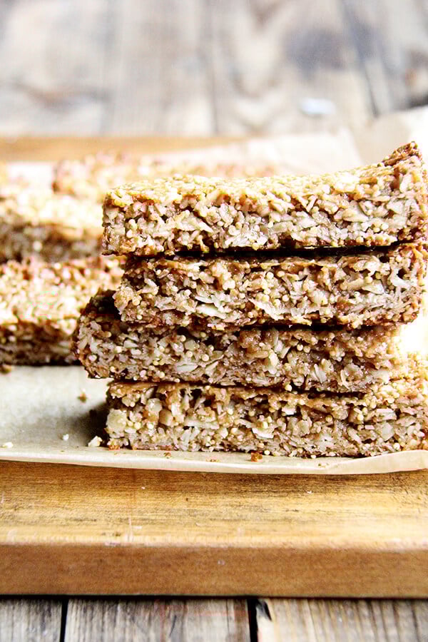 In these granola bars, I use oats, coconut, almonds and millet for the dry ingredients, the same makeup as the granola. For the glue, I use coconut oil or butter, maple syrup, brown rice syrup and almond butter. They hold their shape at room temperature and have thus become a lunch box staple. // alexandracooks.com In these granola bars, I use oats, coconut, almonds and millet for the dry ingredients, the same makeup as the granola. For the glue, I use coconut oil or butter, maple syrup, brown rice syrup and almond butter. They hold their shape at room temperature and have thus become a lunch box staple. // alexandracooks.com