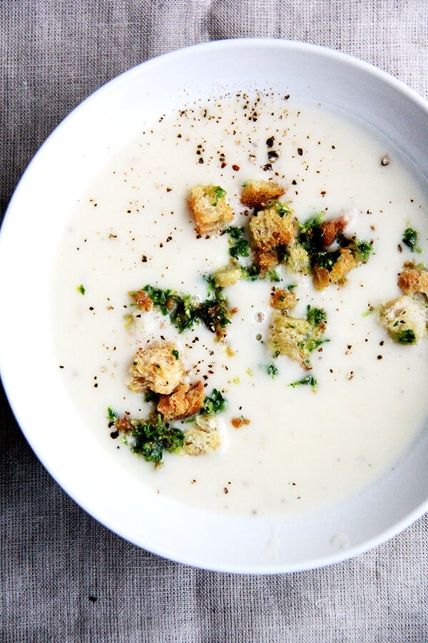 Recently, I've been living on this recipe for Fisher's creamy potato soup. Simple and delicious, the ingredients come together quickly: sauté two onions, add four peeled potatoes and water, simmer till tender, add milk (thickened with a roux), and purée. A deeply satisfying soup perfect for the colder months of the year! // alexandracooks.com Recently, I've been living on this recipe for Fisher's creamy potato soup. Simple and delicious, the ingredients come together quickly: sauté two onions, add four peeled potatoes and water, simmer till tender, add milk (thickened with a roux), and purée. A deeply satisfying soup perfect for the colder months of the year! // alexandracooks.com