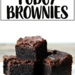 A pile of the best ever rich fudgy brownies on a plate.
