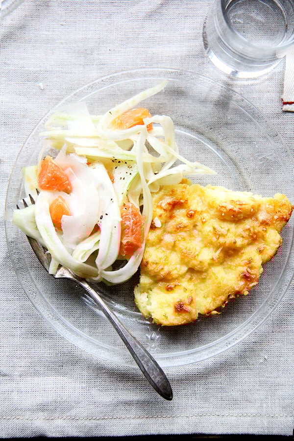 Made with milk, semolina flour, parmesan and egg yolks, this baked semolina gnocchi bears little resemblance to potato gnocchi. They taste more like polenta in fact, but are lighter in texture. In addition to being incredibly delicious, the beauty of gnocchi alla Romana is that it can be completely assembled ahead of time — up to two days — and baked just before serving. // alexandracooks.com Made with milk, semolina flour, parmesan and egg yolks, this baked semolina gnocchi bears little resemblance to potato gnocchi. They taste more like polenta in fact, but are lighter in texture. In addition to being incredibly delicious, the beauty of gnocchi alla Romana is that it can be completely assembled ahead of time — up to two days — and baked just before serving. // alexandracooks.com
