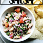 A bowl of white bean salsa.
