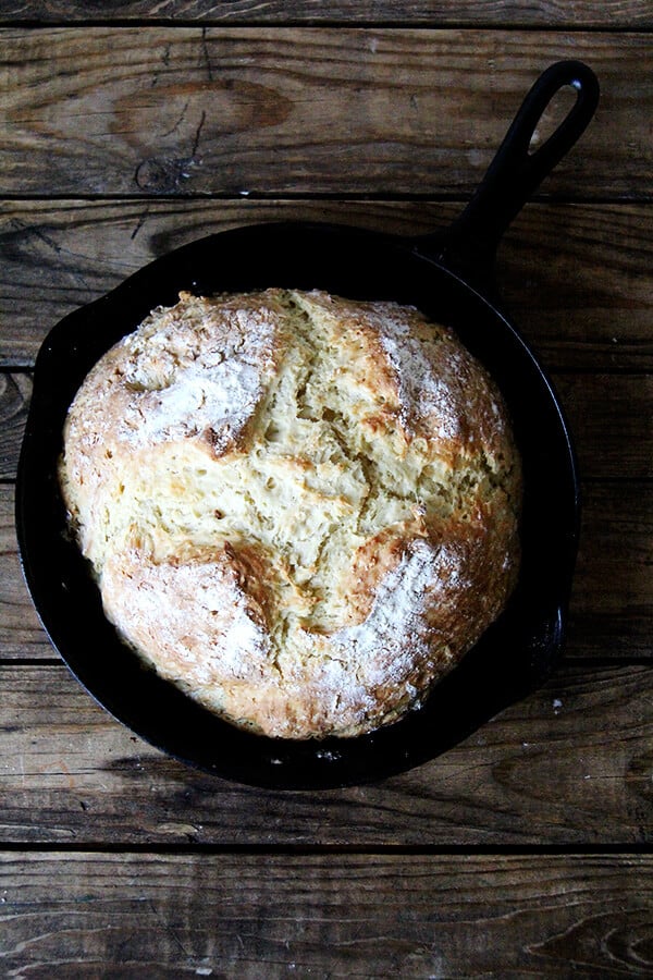 Just-baked Irish soda bread in a cast iron skillet.